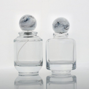 30ml 50ml 100ml Wholesale glass perfume bottle with resin ball cap