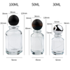 30ml 50ml 100ml Wholesale glass perfume bottle with resin ball cap