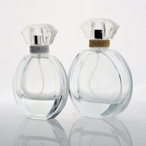 50ml 100ml Flat Round Glass Perfume Bottle with Fan-Shaped Lid